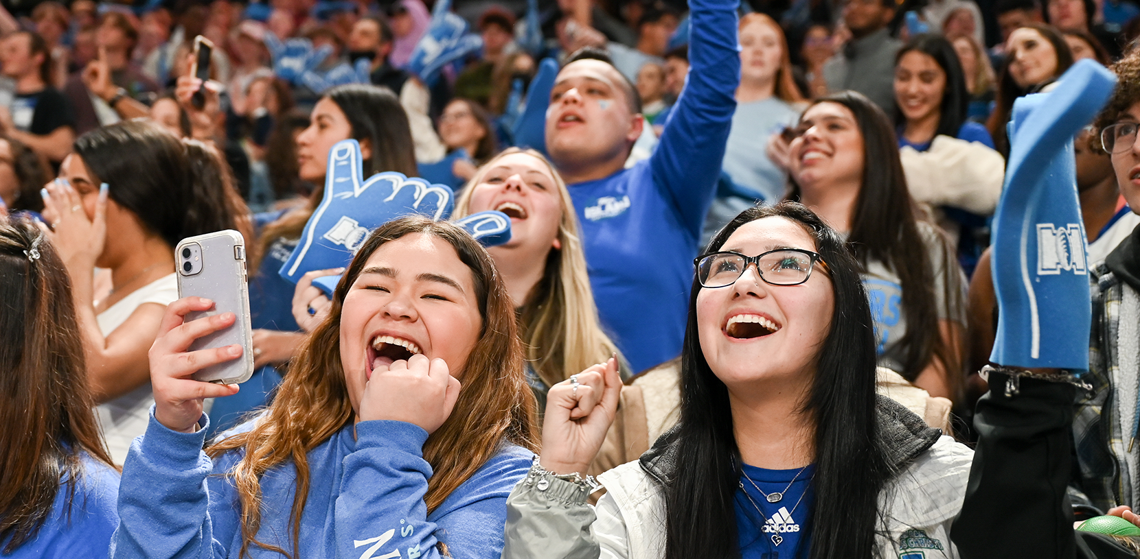 Students excited at a college game