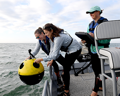 HRI Bay trip - students on a boat at sea